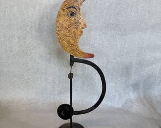 Kinetic balancing iron crescent moon sculpture