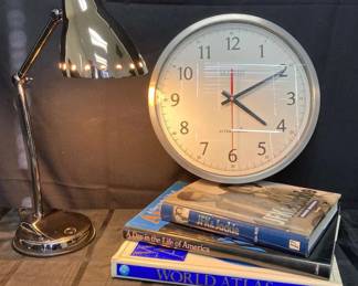 CT675La Crosse Clock, Desk Lamp, And Books