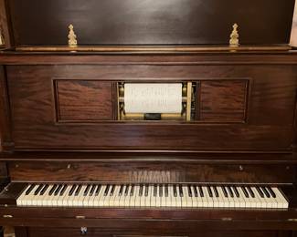 Player Piano with large selection of rolls. Make offer. I have Moving guys who can deliver for an added fee. 