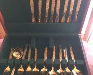 Goldtone stainless "Caress"