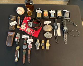 Zippo Wine Glass Lighter, Zippo Full House Lighter, Sterling Mayan Design Belt Buckle, Garmin Watch, Swiss Army Calvary Watch, Swiss Army Victorinox Watch, Buck 110 Folding Utility Tool