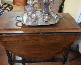 silverplate service, drop leaf table