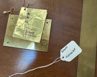 F48 - $50. Schott Chest on Stand. One band of trim needs reglued. Measures 18.75" wide x 13" deep x 21.5" tall. 