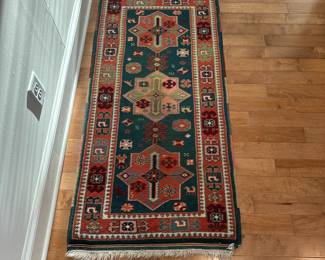 F59 - $125. Vintage Rug. Measures 28" Wide x 5' Long