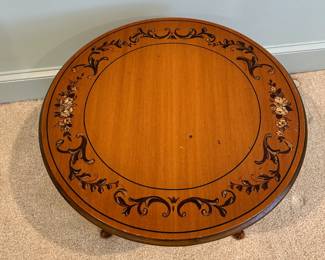 F4 - $75. Small Round Side Table with design painted on. Measures 23.5" round x 16" tall. 