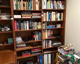 F121 - $1200. Mid Century Teak Wall Unit moves in 3 pieces. Minor water (?) damage to one drawer. All drawers slide easily. Assembled Both Sections measure 54.5" wide x 12" deep x 76.5" tall. (desk out measures 29".) Base on left is 3rd piece. 54.5" wide x 17" deep. 