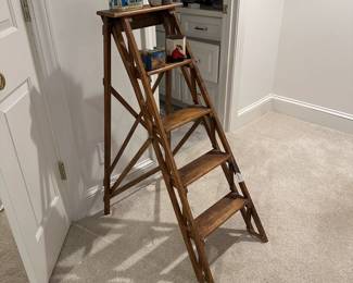 F115 - $40. Decorative Ladder. Measures 16" wide x 30" deep x 41.75" tall. 