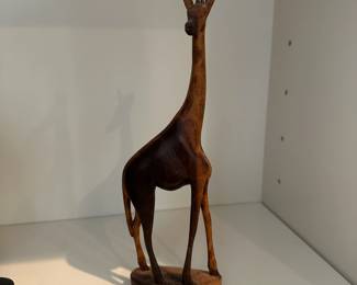 F62 - $20. Carved Wooden Giraffe. Measures 3" Wide x 9" Tall