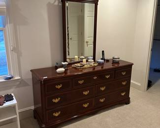 F111 - $450. Drexel Dresser with Mirror. Measures 66" long x 19" deep x 30.5" tall. Mirror is 25" x 48". All drawer slide. Very good condition!