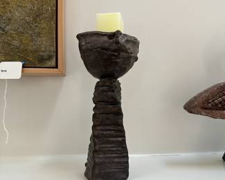 F38 - $30. Unsigned Pottery Piece used to hold an unburned Candle. Measures 5" Wide x 5" Deep x 9" Tall
