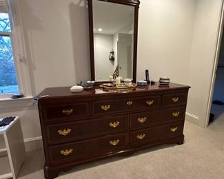 F111 - $450. Drexel Dresser with Mirror. Measures 66" long x 19" deep x 30.5" tall. Mirror is 25" x 48". All drawer slide. Very good condition!
