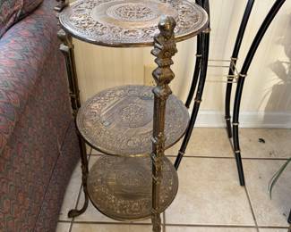 	#46	3 tiered brass table 27"H	 $40.00 				