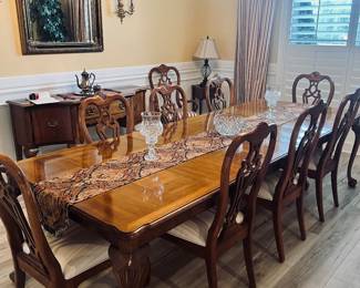 Thomasville dining table with seating for 10.