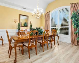 Thomasville dining table with seating for 10, chandelier and all accessories & decor