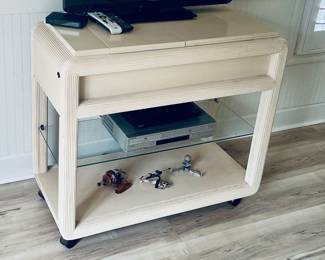 White TV stand, 38 x 18 x 34, 35" TV (partially shown)