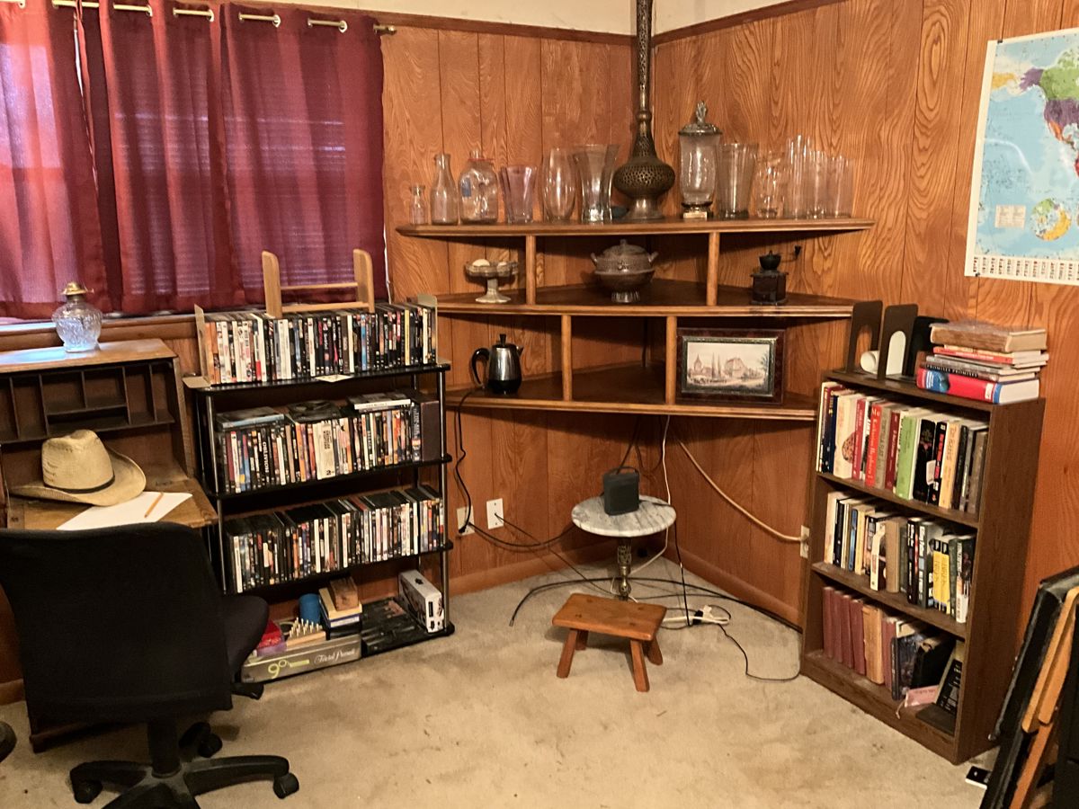 Collectible Glassware, Lots Of Dvd's, Books, media Racks and Bookcases