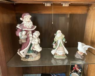 Christmas figurines, some wind up musical.