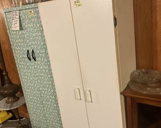 Vintage Metal US made cupboard with cool applique. Older better made heavy melamine cupboard.