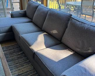 Bassett light blue Sectional couch. Has been well loved but still in great condition!