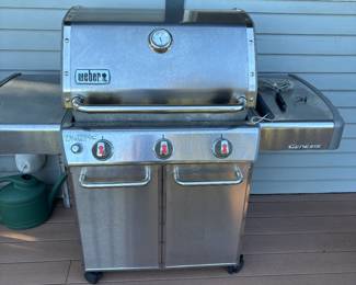 Weber Genesis BBQ- has always been kept under cover. Comes with fitted cover.