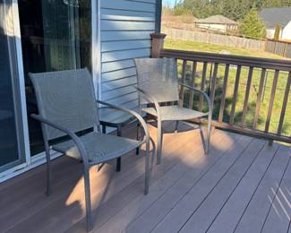 Outdoor patio set with small glass side table