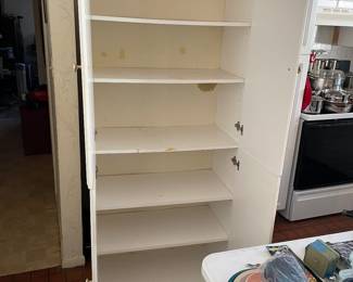 This is a PRE-SALE ITEM -  There are 2 (two) separate 4- door white cabinets with shelves   Dimensions are   71 1/2" H, 15 1/2" D, 29 1/2" W - You can buy 1, 2 or all 3 -  They are priced separately and sold AS IS.    $75 EACH plus 7% sales tax.  