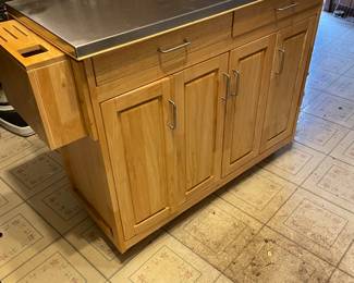 This is a PRE-SALE item - Rolling kitchen inland with expandable leaf - stainless steel top and storage - H 36" D 20 1/2" W 53" fully open.  Great functional piece!  Sold AS IS  - priced at $275 plus 7% sales tax.