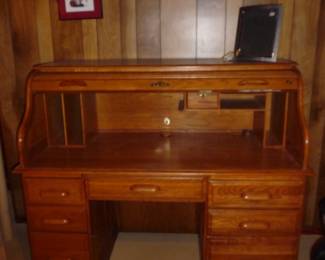 Roll top desk = open