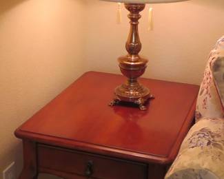 End tables, brass lamps
