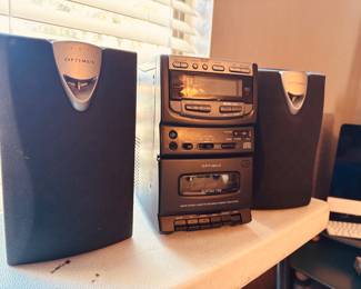 Optimus Sound System w/speakers; AM/FM radio, cassette and CD player