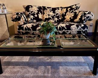 Black lacquer and gold glass top coffee table