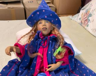 “Pinki Pli” 2001 by Annette Himstedt, signed on shoes.   Red hair, Magicians cape and hat. Original clothes. 24”