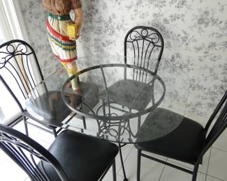 Glass top kitchen table and 4 chairs