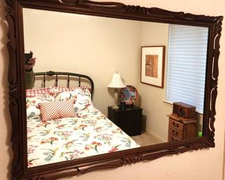 Hand carved walnut framed mirror