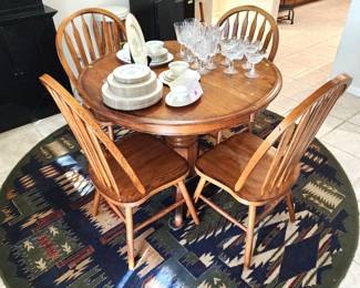 Nice oak table with four side chairs