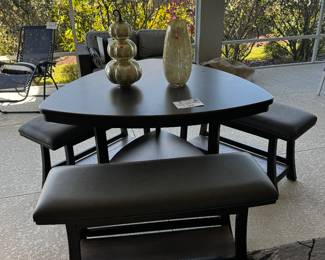 Triangle style high top dining table with 3 benches. $500