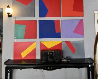 There are other pieces of art here in this sale.  This is one display of them.  And of course the side table and small bookshelf stereo are not to be ignored.