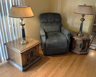 This picture shows the matching table lamps, an easy chair, and two different end tables, one of which is octagonal.