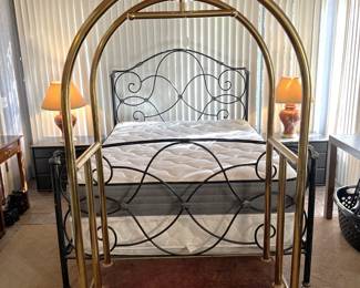 This is unusual, at least out of hotels.  This is a hotel-style luggage cart, in front of the bed.