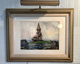 This framed painting was apparently loved enough to warrant a light.  Come take a look for yourself.