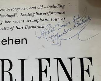 The "...st mein liebe Marlene Dietrich" is pretty clear, but the leading characters are less clear.  We leave it up to you to decipher the words.