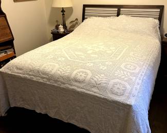 White ornate bedspread - one stain