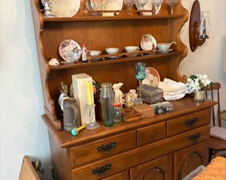 . . . nice maple china hutch filled with treasures!