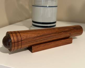 Wooden carved kaleidoscope on stand