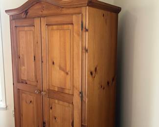 Honey colored Pine Wardrobe with lots of storage!