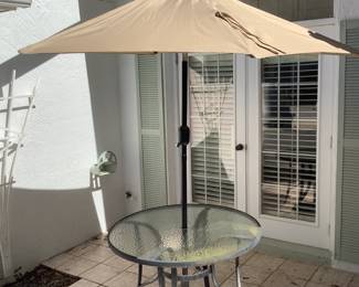 Patio table with cafe tilting umbrella