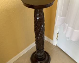 Carved wood plant stand