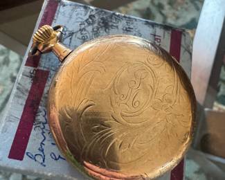 Gold pocket watch 
