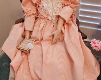 Porcelain dolls and chair
