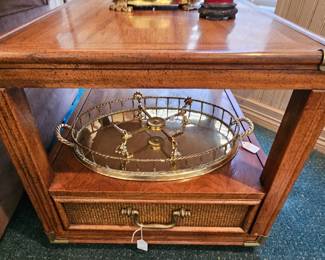 End table with brass accents